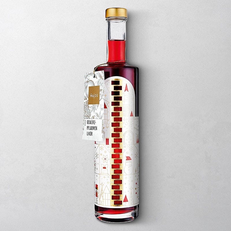 WAJOS ADVENTSKALENDER FLASCHE – GEFÜLLT MIT GEWÜRZPFLAUMEN LIKÖR - 500ml - 18% vol