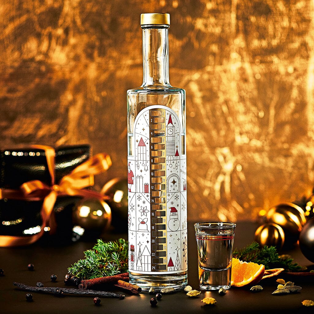 WAJOS Adventskalender Flasche – gefüllt mit Alte Haselnuss Likör- 500ml - 42% vol